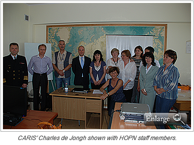 CARIS’ Charles de Jongh shown with HOPN staff members.